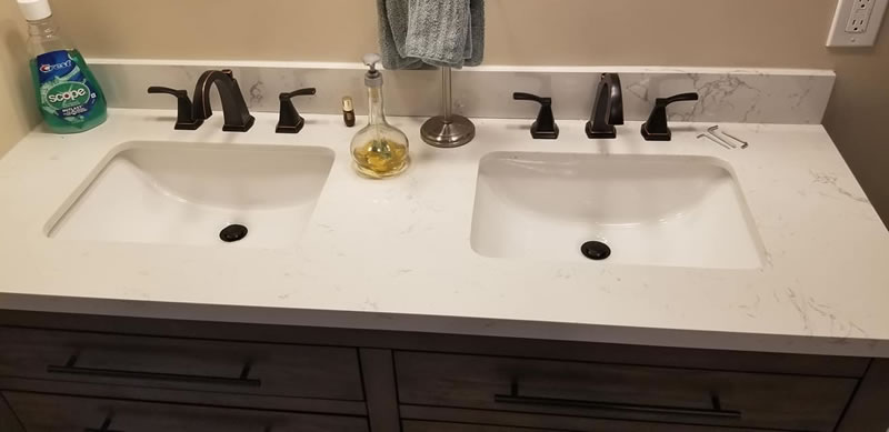 Dual Bathroom Vanity With Quartz Countertop, Dual Sinks and Modern Plumbing Fixtures