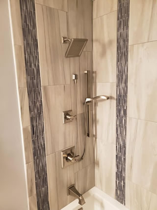 A Beautiful Tile and Marble Shower Installed By Star Remodeling